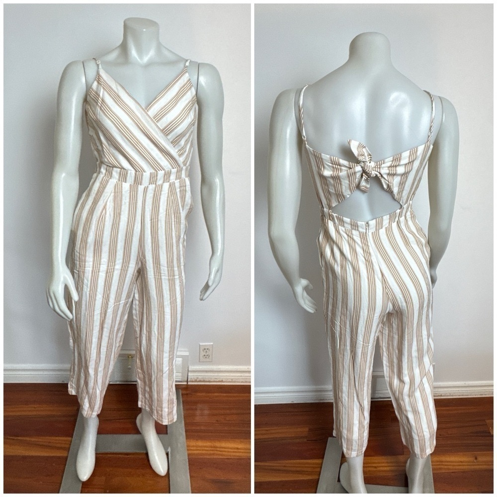 DEX - Striped Jumpsuit with Open and Tie-Back. 
Size XS